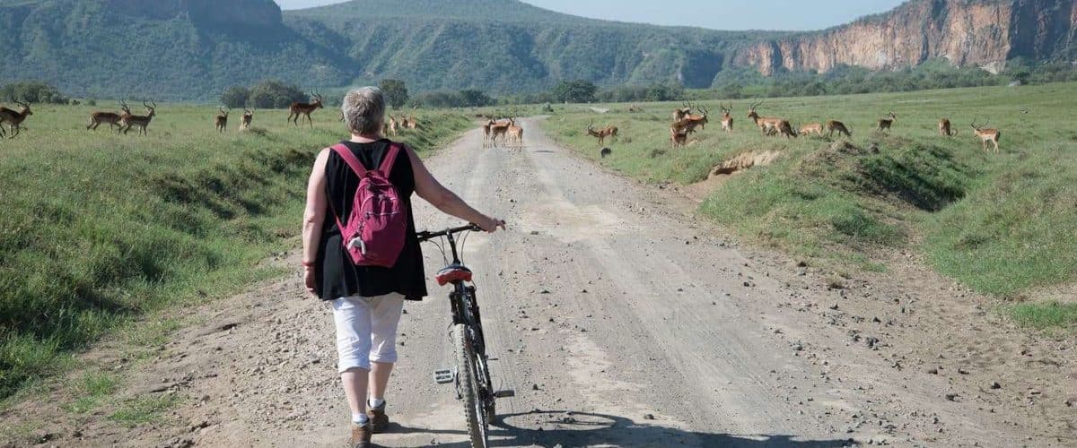 The red cliffs and open track of Hell's Gate National Park near Lake Naivasha